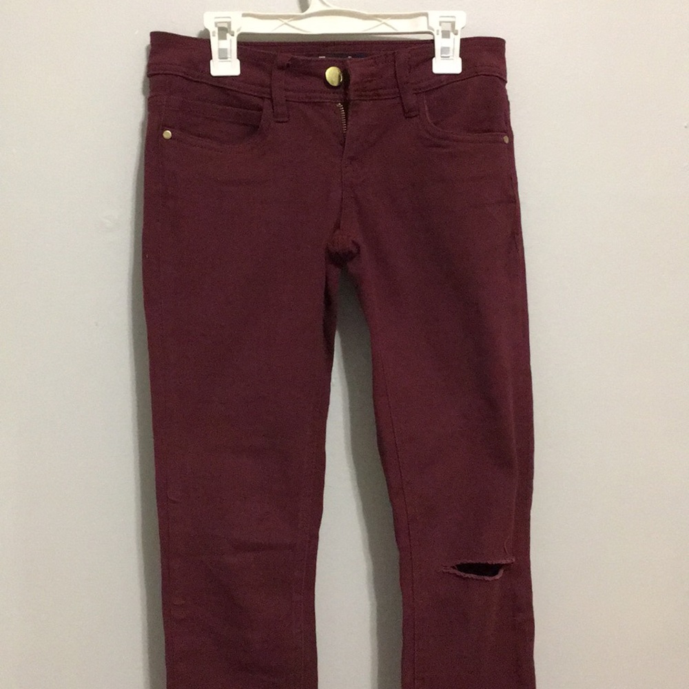 Size 1 mid-rise burgundy skinny jeans